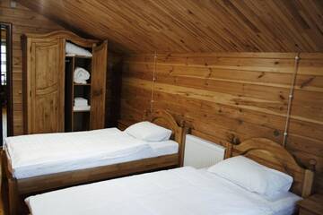 Фото номера Коттедж с 3 спальнями Отель Green Park Hotel Airport Minsk г. Smolnitsa 4